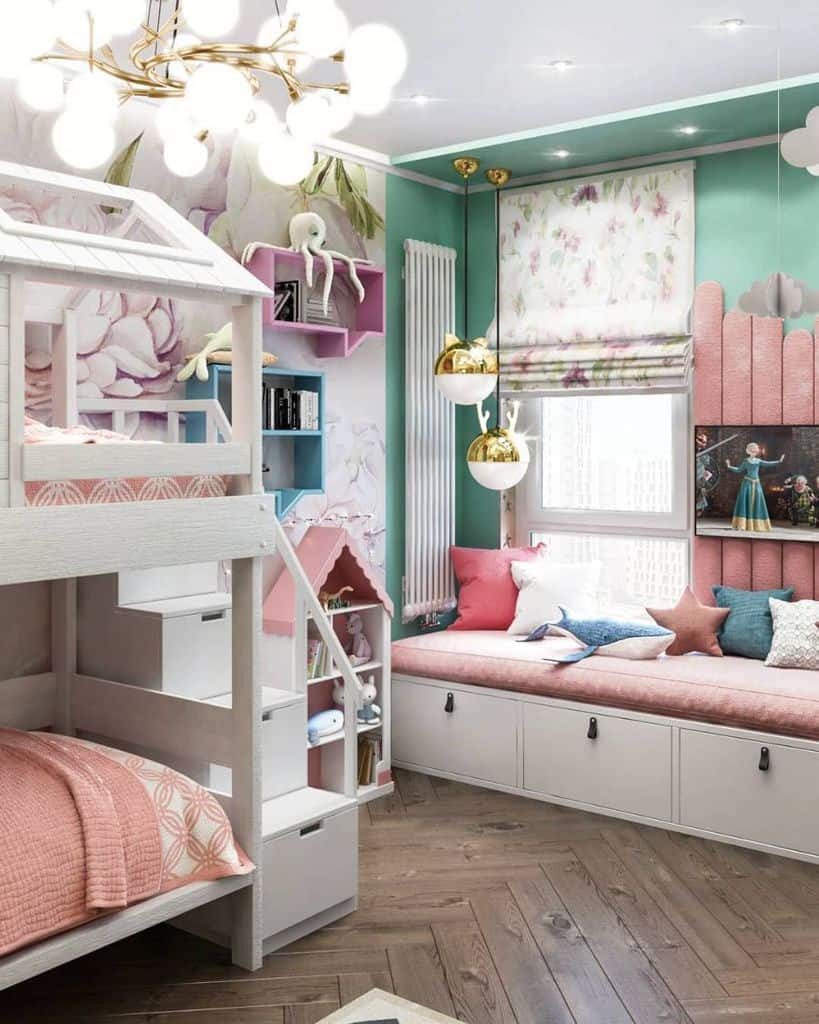 Vibrant kids' bedroom with a white bunk bed, built-in storage, floral wallpaper, cozy reading nook, and pastel decor accents