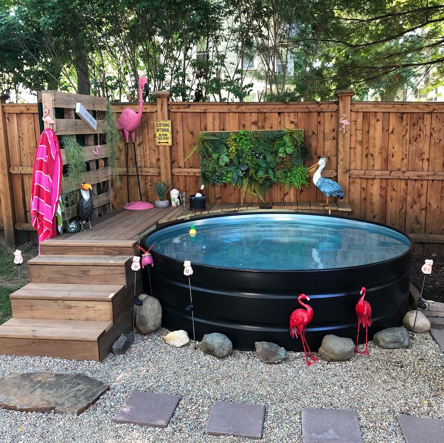 Stock tank pool surrounded with rocks