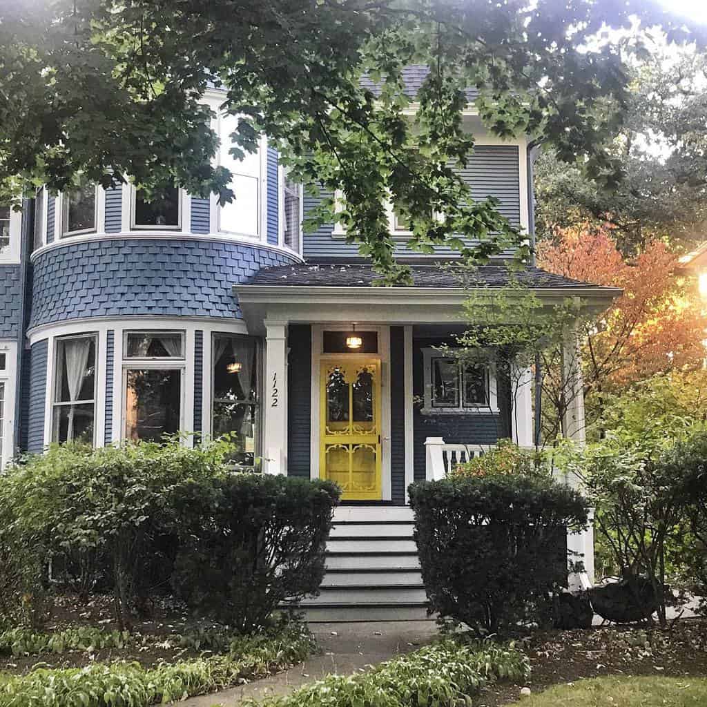 House with yellow-painted door