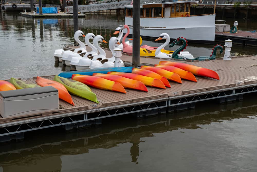 Colorful,Kayaks,Lay,Down,On,The,Wooden,Floor,Group,Of