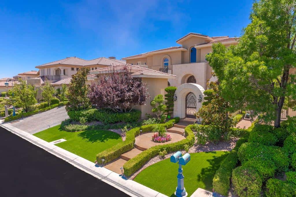 Front yard with well maintained hedges