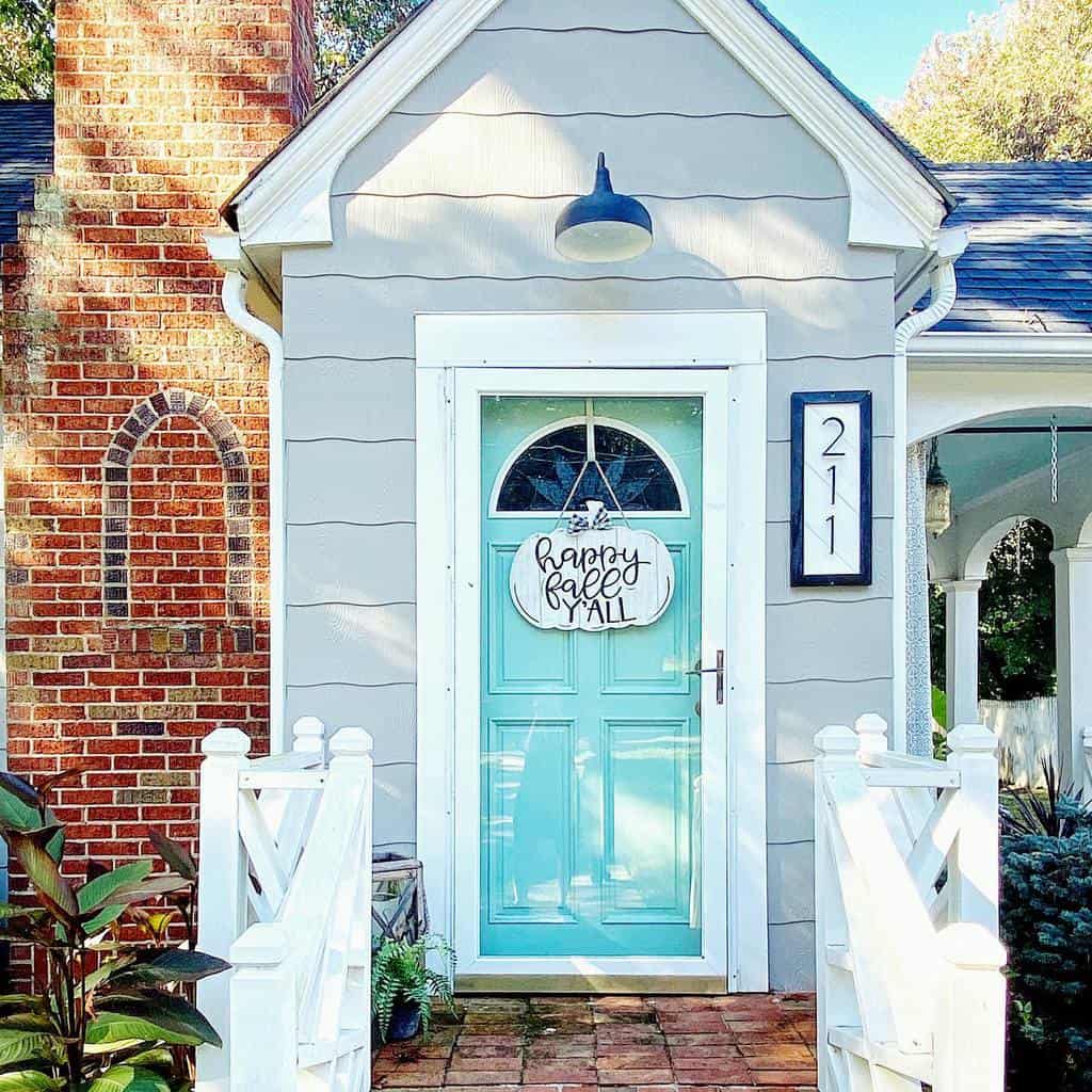 Front door with wall art