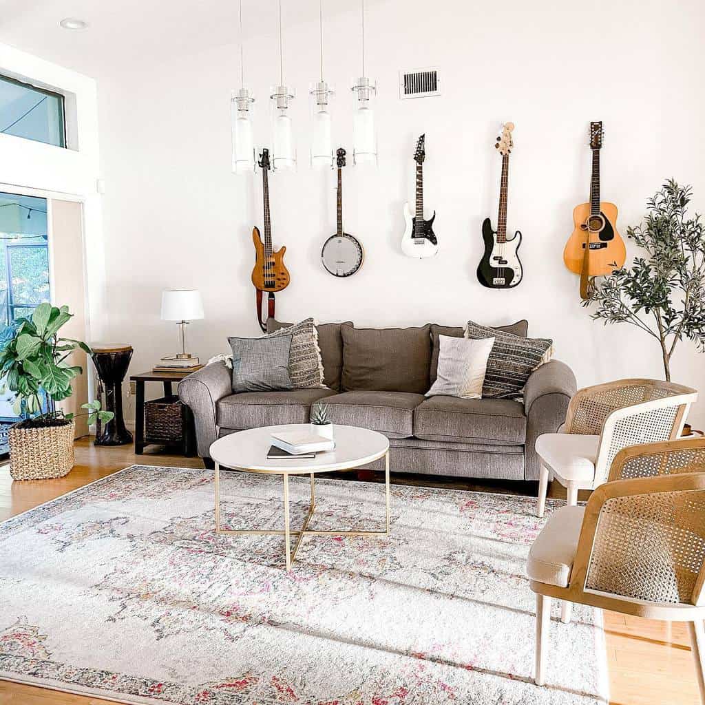 Bright and stylish living room with wall-mounted guitars, a banjo, a cozy gray sofa, modern lighting, a patterned rug, and indoor plants