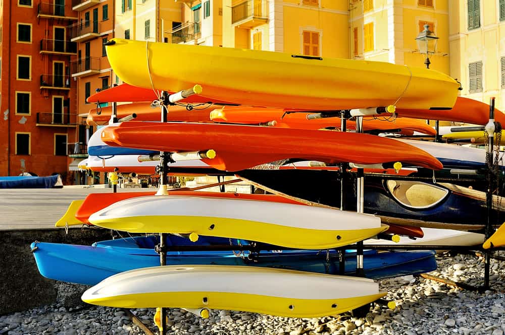 Outdoor storage of colorful kayaks