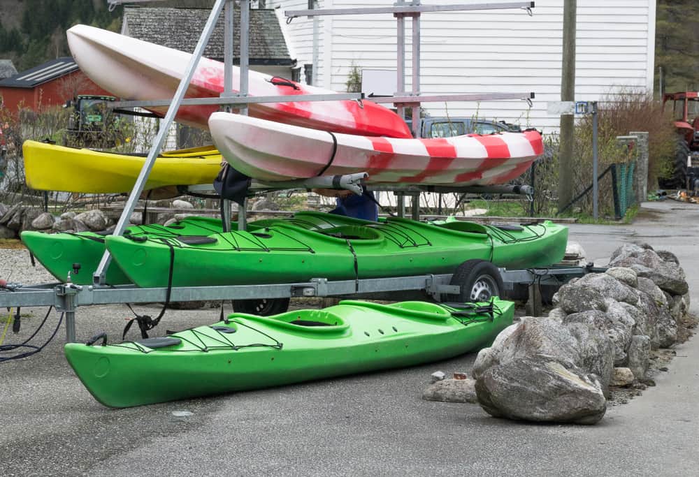 Kayaks on trailer storage in rural area