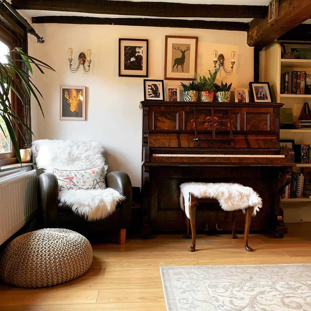 Cozy rustic music room with a vintage upright piano, wooden beams, plush seating, warm lighting, and nature-inspired decor