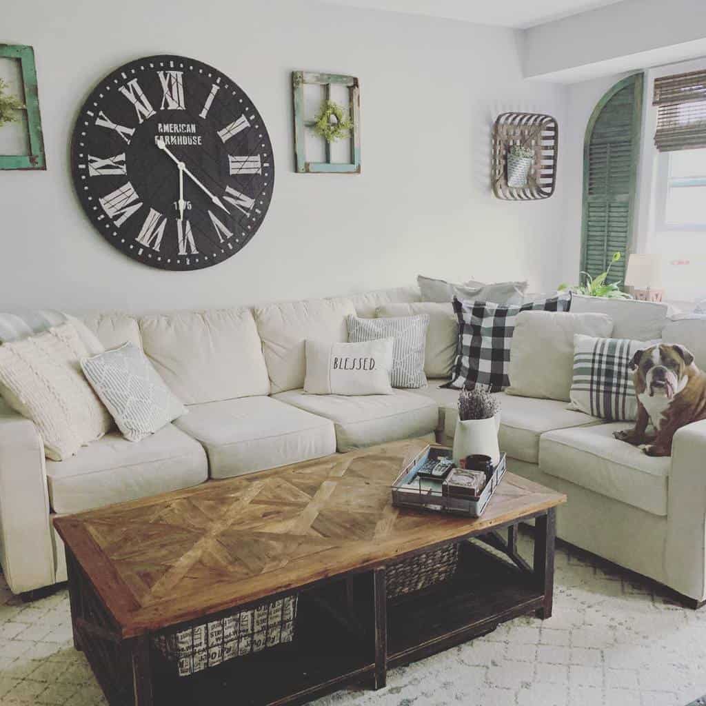 Rustic wooden coffee table with a herringbone top and storage baskets, styled with a tray and decor, set in a cozy farmhouse living room