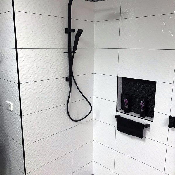 walk-in shower with recessed shelves