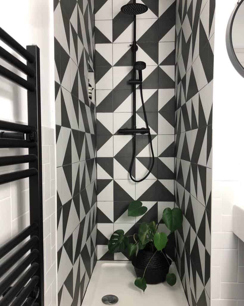 doorless walk in shower with decorative tiles