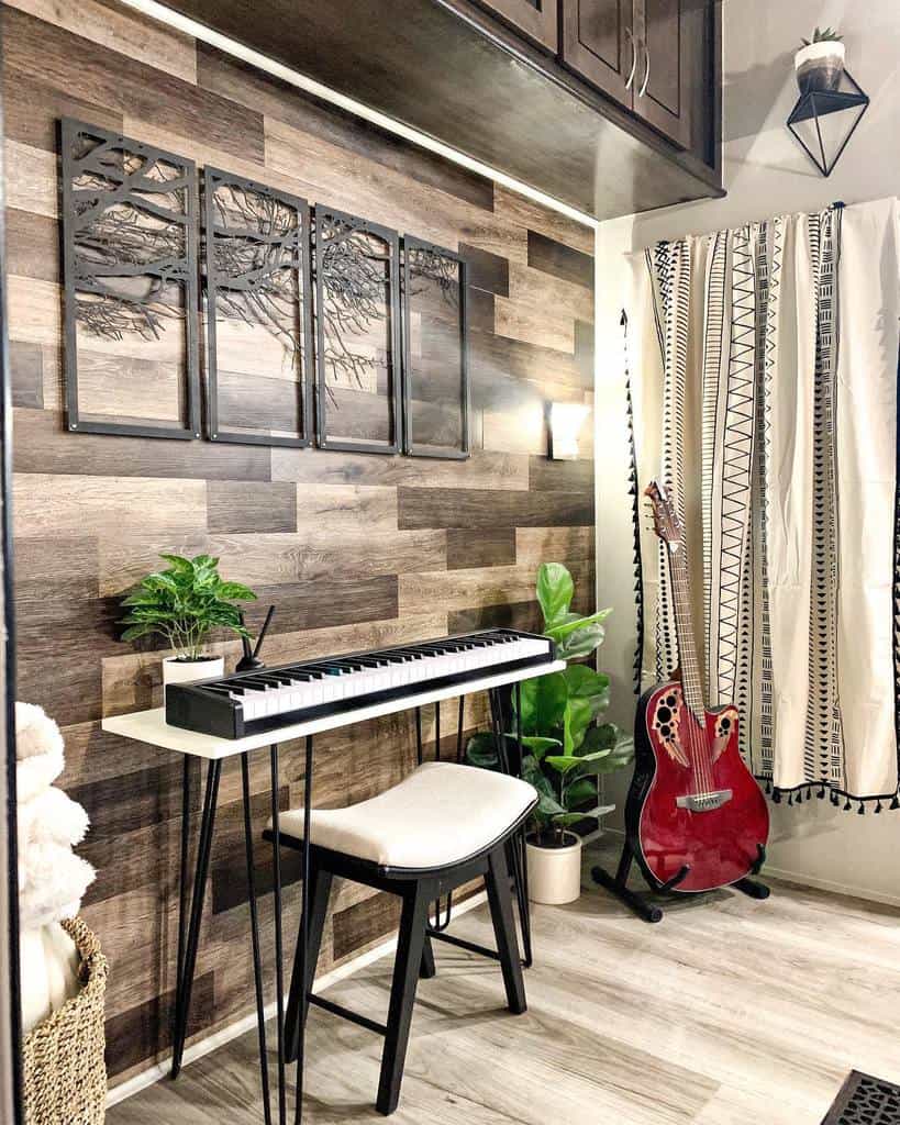 Stylish music nook with a minimalist keyboard setup, rustic wood accent wall, modern decor, a red acoustic guitar, and cozy lighting