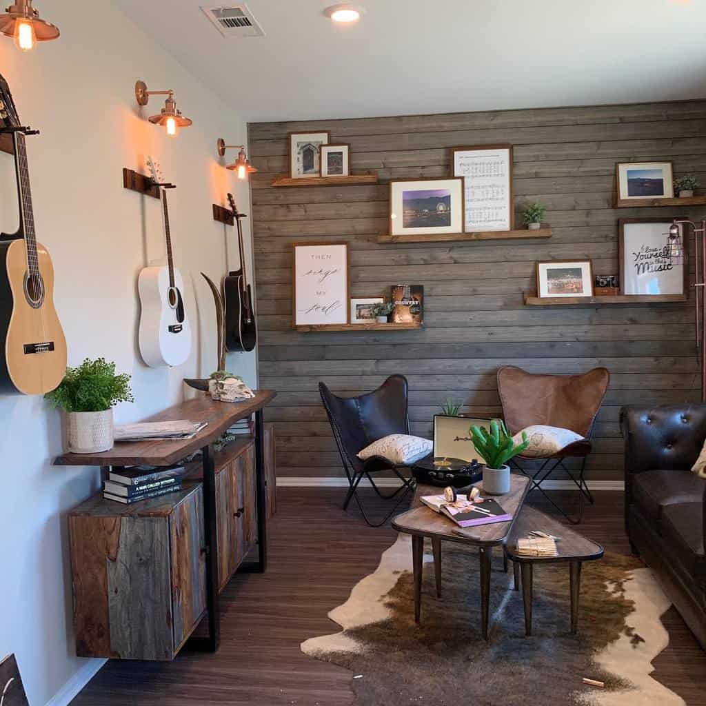 Rustic music room with wall-mounted guitars, warm wood accents, industrial lighting, cozy seating, and stylish floating shelves