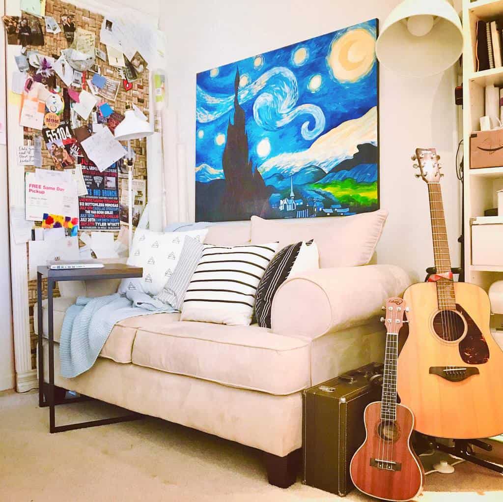 Cozy music room with a beige sofa, guitars, a Starry Night-inspired painting, a creative pinboard, and warm, inviting decor