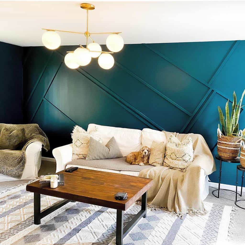 Modern wood coffee table with a dark finish and black metal legs, set in a cozy living room with a bold accent wall and warm decor