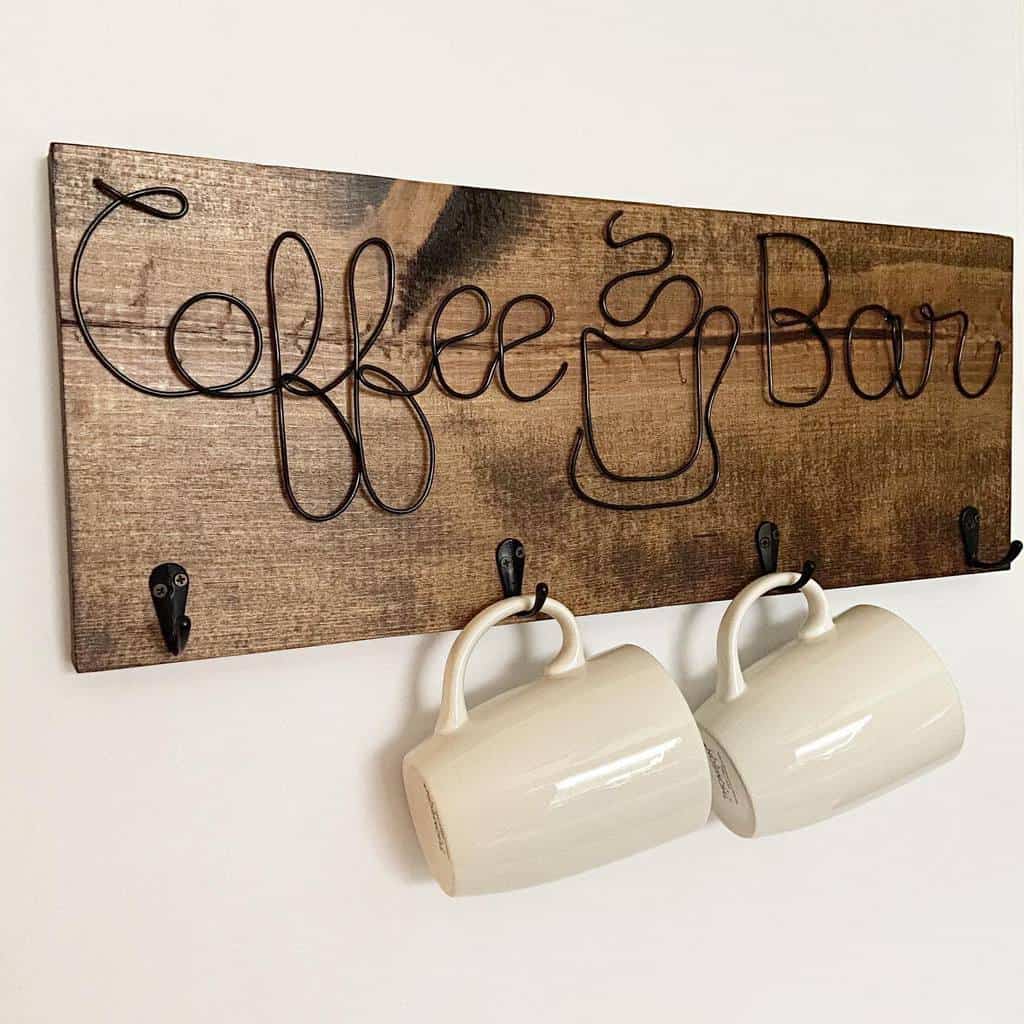 Wooden "Coffee Bar" sign with hooks holding two white mugs