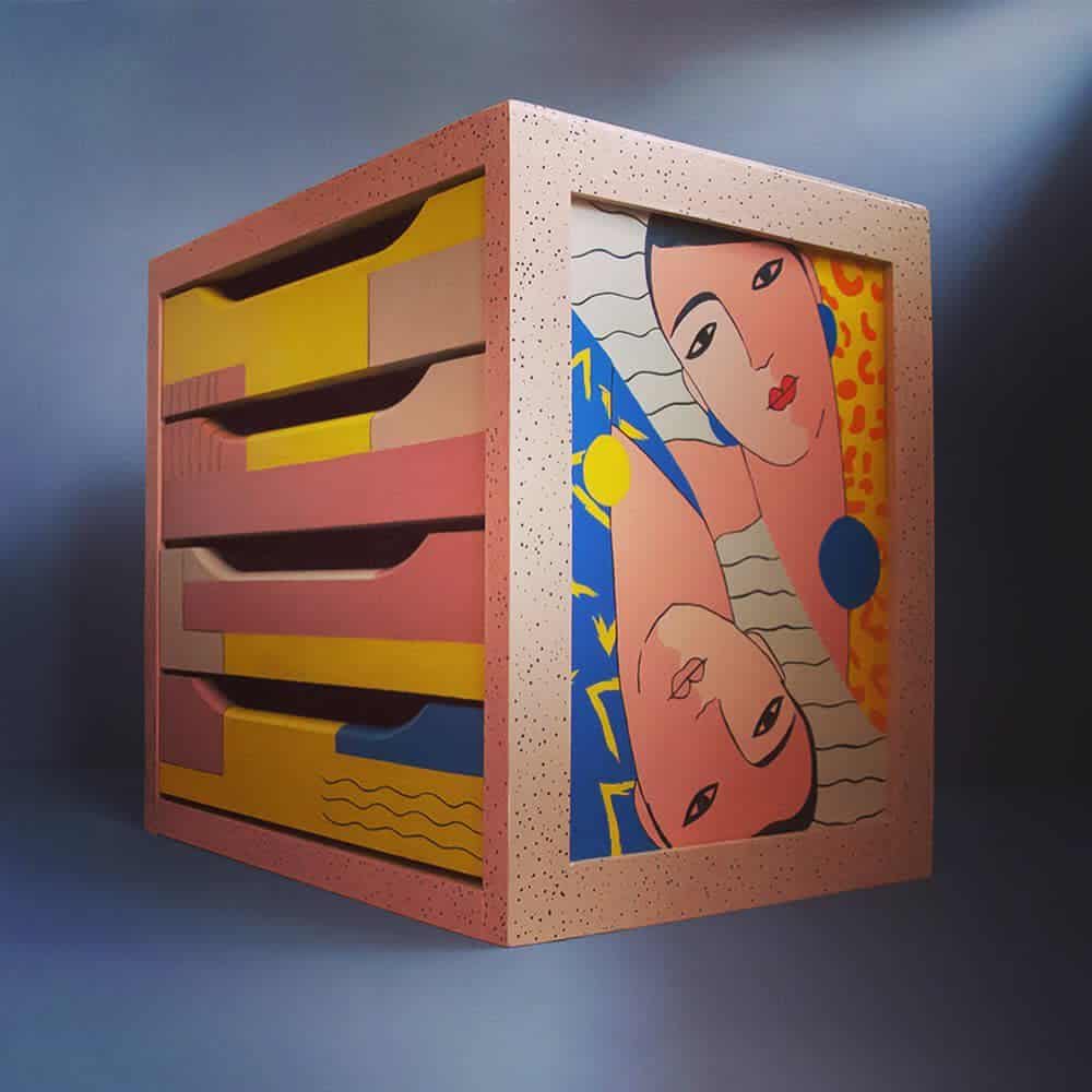 Bold hand-painted dresser with geometric drawer designs in yellow, pink, and blue, featuring an artistic portrait on the side panel