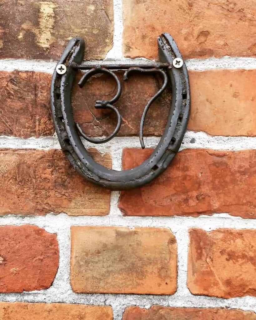 repurposed horse shoe house number