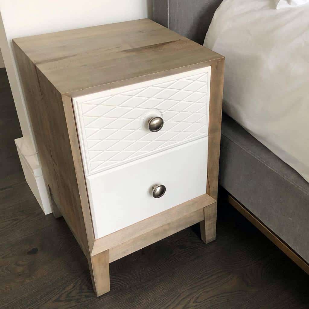 white-washed wooden nightstand