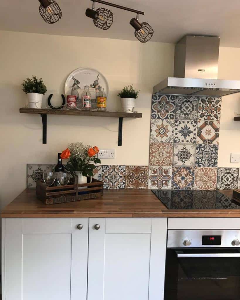 Cozy kitchen with a wooden countertop, patterned backsplash, and shelves holding decor items and plants, modern stove and oven included