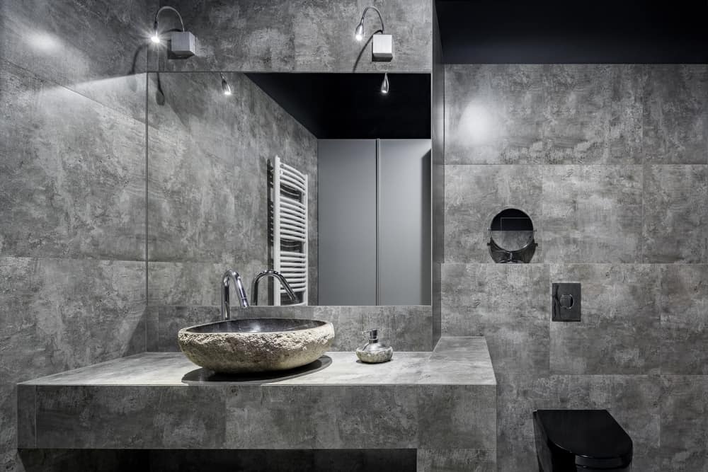 Dark,Bathroom,With,Gray,Wall,Tiles,,Modern,,Stone,Style,Washbasin