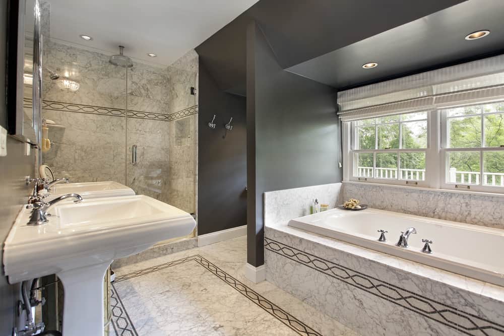 Modern,Master,Bath,With,Marble,Flooring,And,Glass,Shower