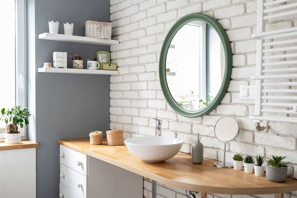 bathroom with sink in a wooden counter