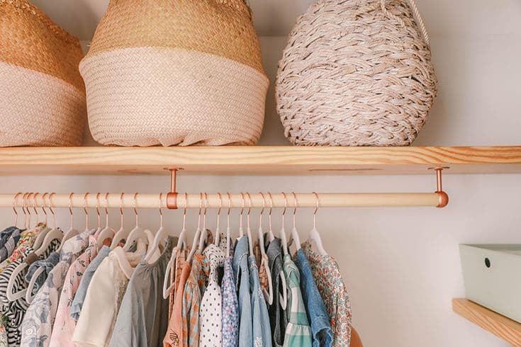store clothes in a floating shelf without a closet