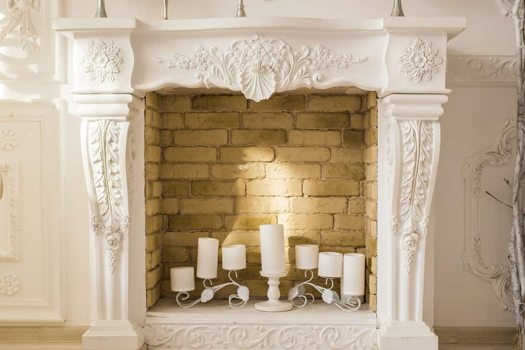 unused fireplace with candle lights