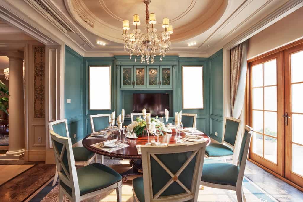 chandelier above dining room table