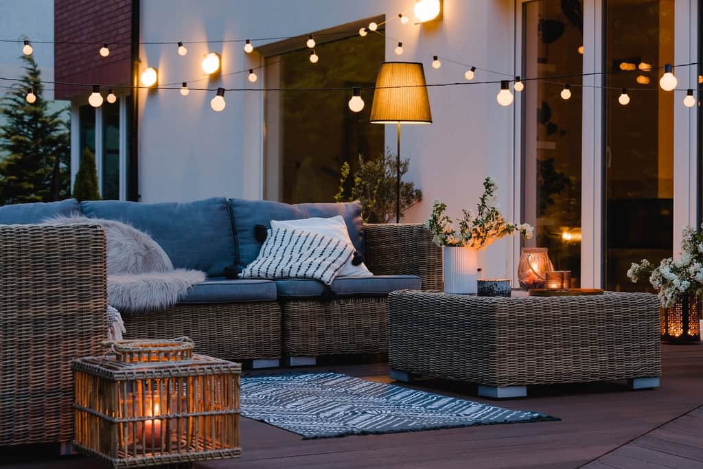 Outdoor patio in the summer evening with lights