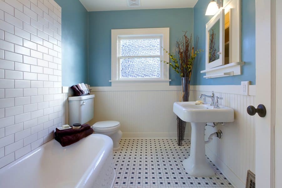 blue color paint with black and white tile bathroom