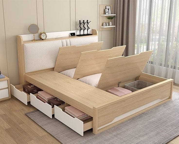 Modern wooden bed with lift-up storage compartments and side drawers