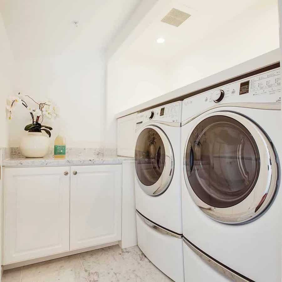 laundry room with cabinetry