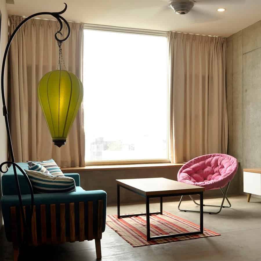 Chic room with hot air balloon lamp and pink chair