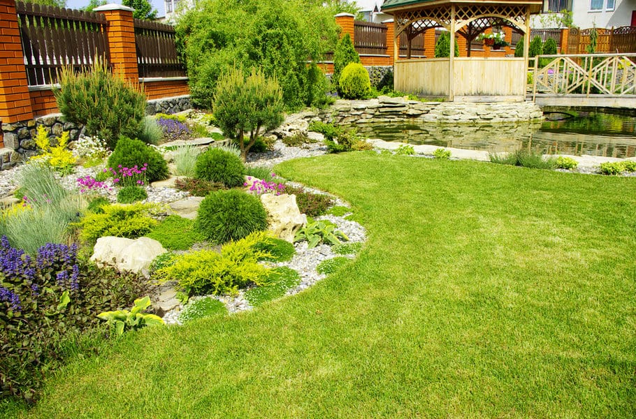 Lush garden with pond and gazebo