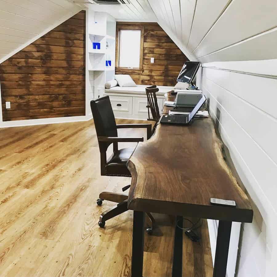 Rustic attic office with live-edge desk and shiplap walls