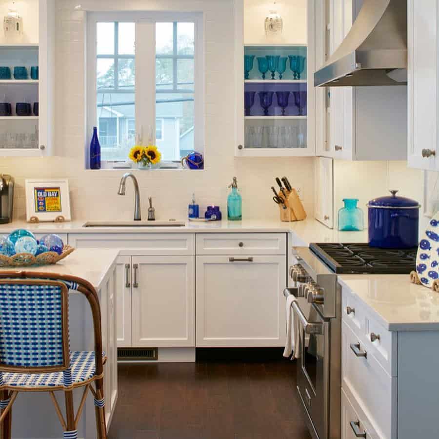 white kitchen with blue decor