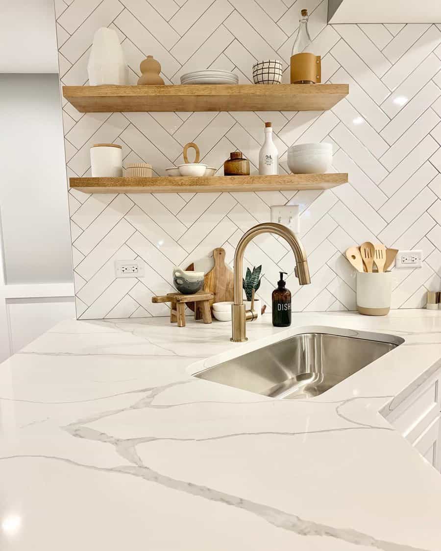 White kitchen with white beveled tiles