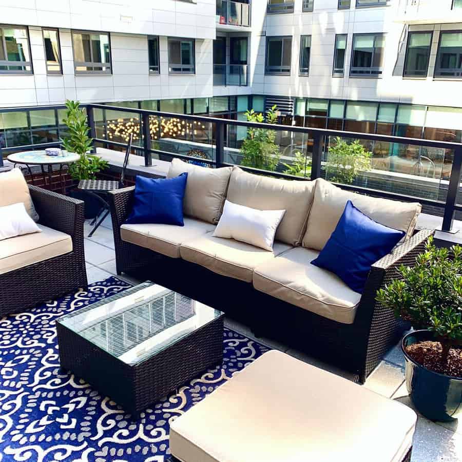 Apartment patio with throw pillows