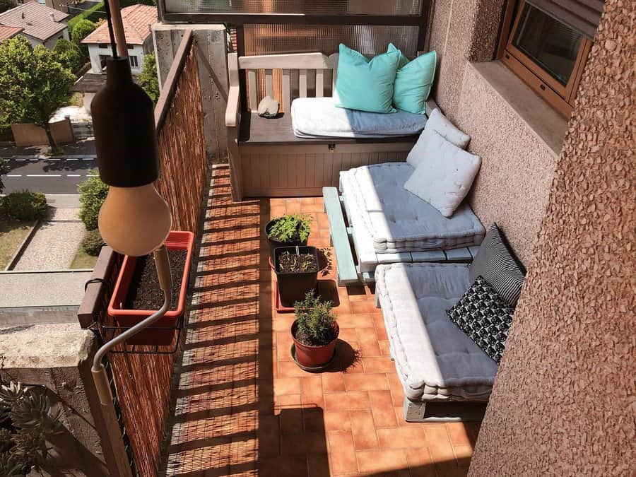 Apartment patio with throw pillows