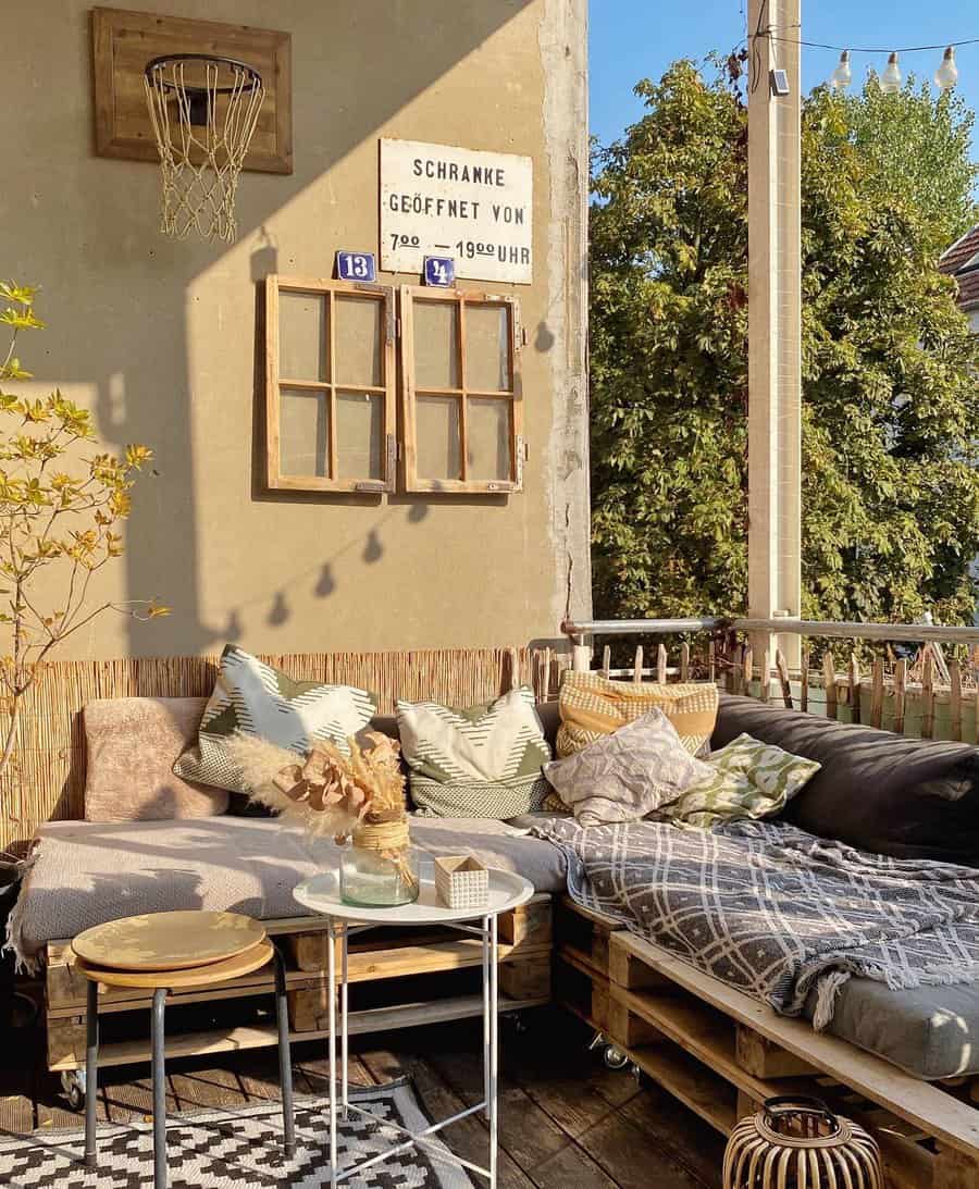 Apartment patio with wood pallet furniture