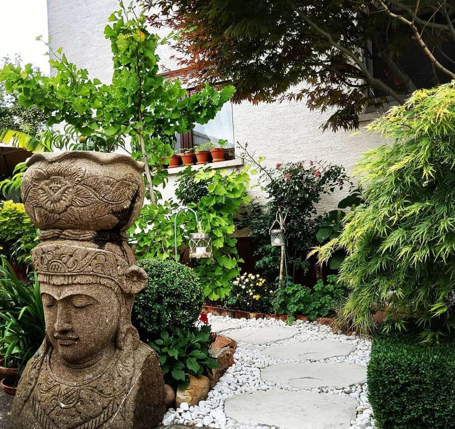 tropical garden with garden statue