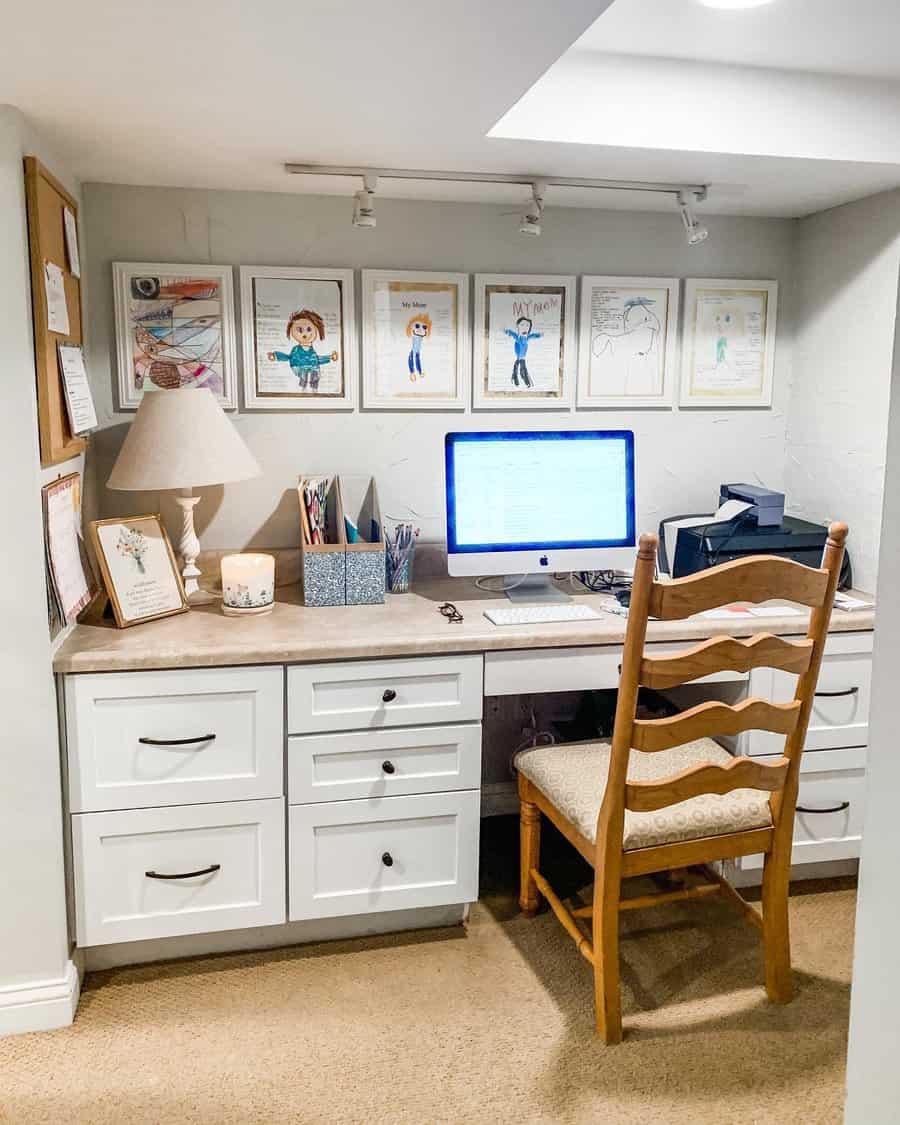 bedroom office space with wall art 