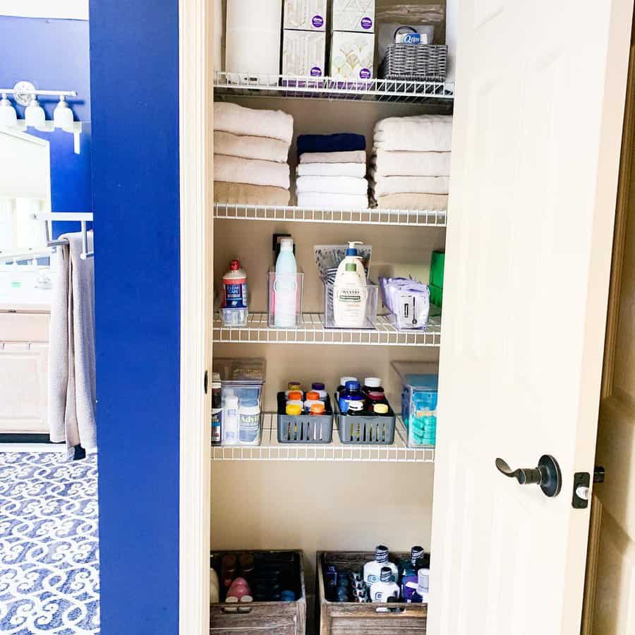 Bathroom closet with baskets