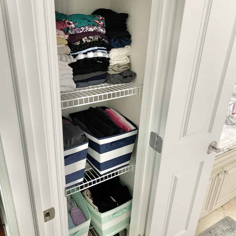 Bathroom closet with baskets