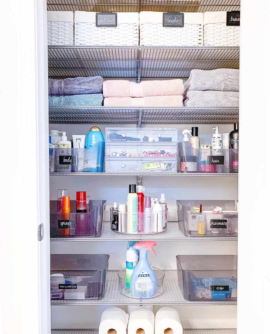 Bathroom closet with bins