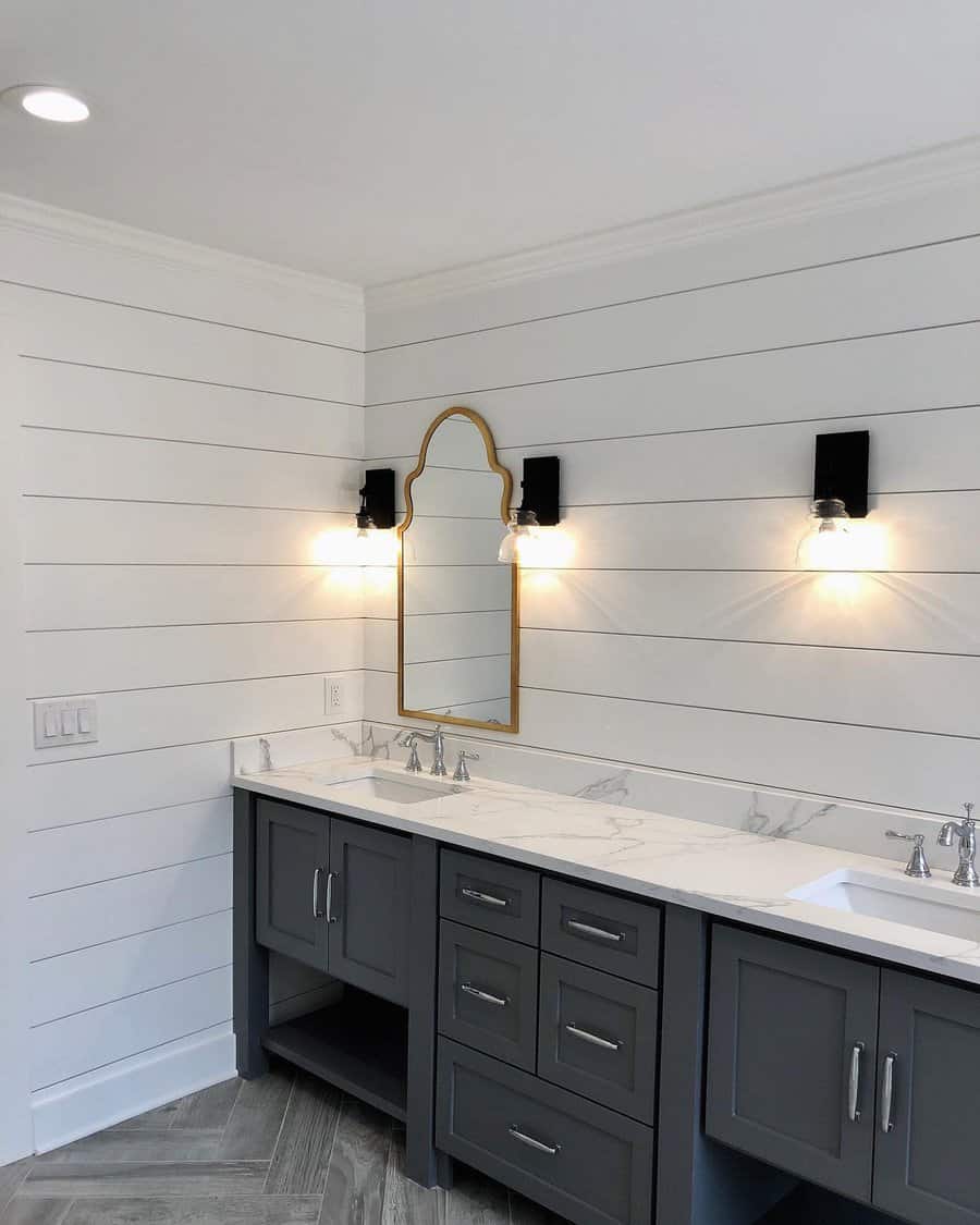Bathroom With Shiplap Wall With Pendant Wall Lamps