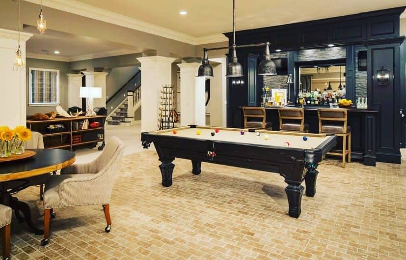 Elegant basement with pool table and bar area