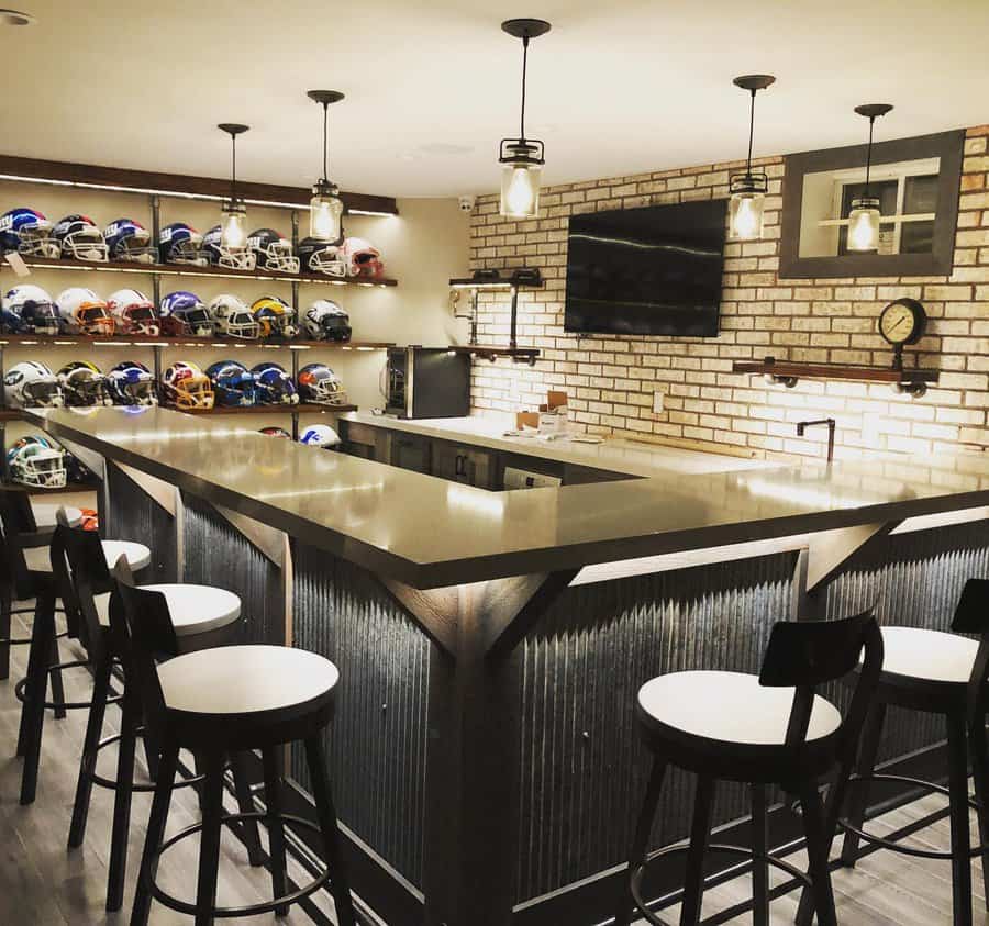 Chic sports bar with helmet wall decor and stools