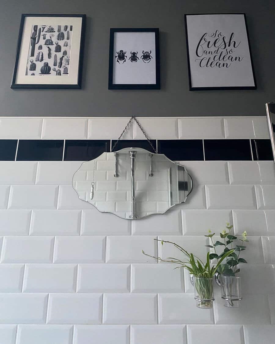black and white wall art in bathroom