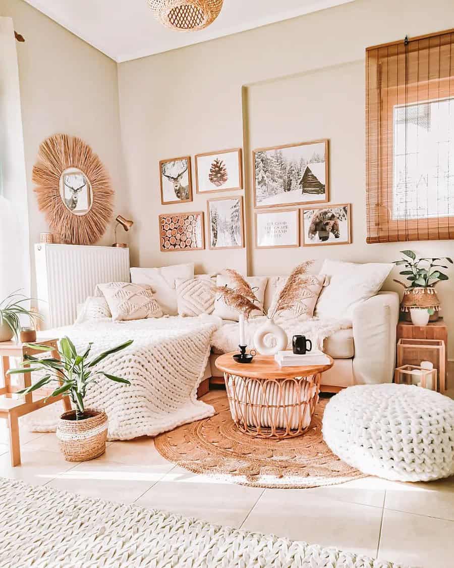 Cozy living room with neutral tones, plants, a knit blanket, and nature-themed decor